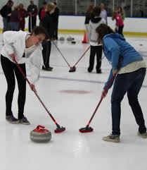 woman playing the curling sport