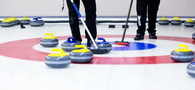 playing the curling sport